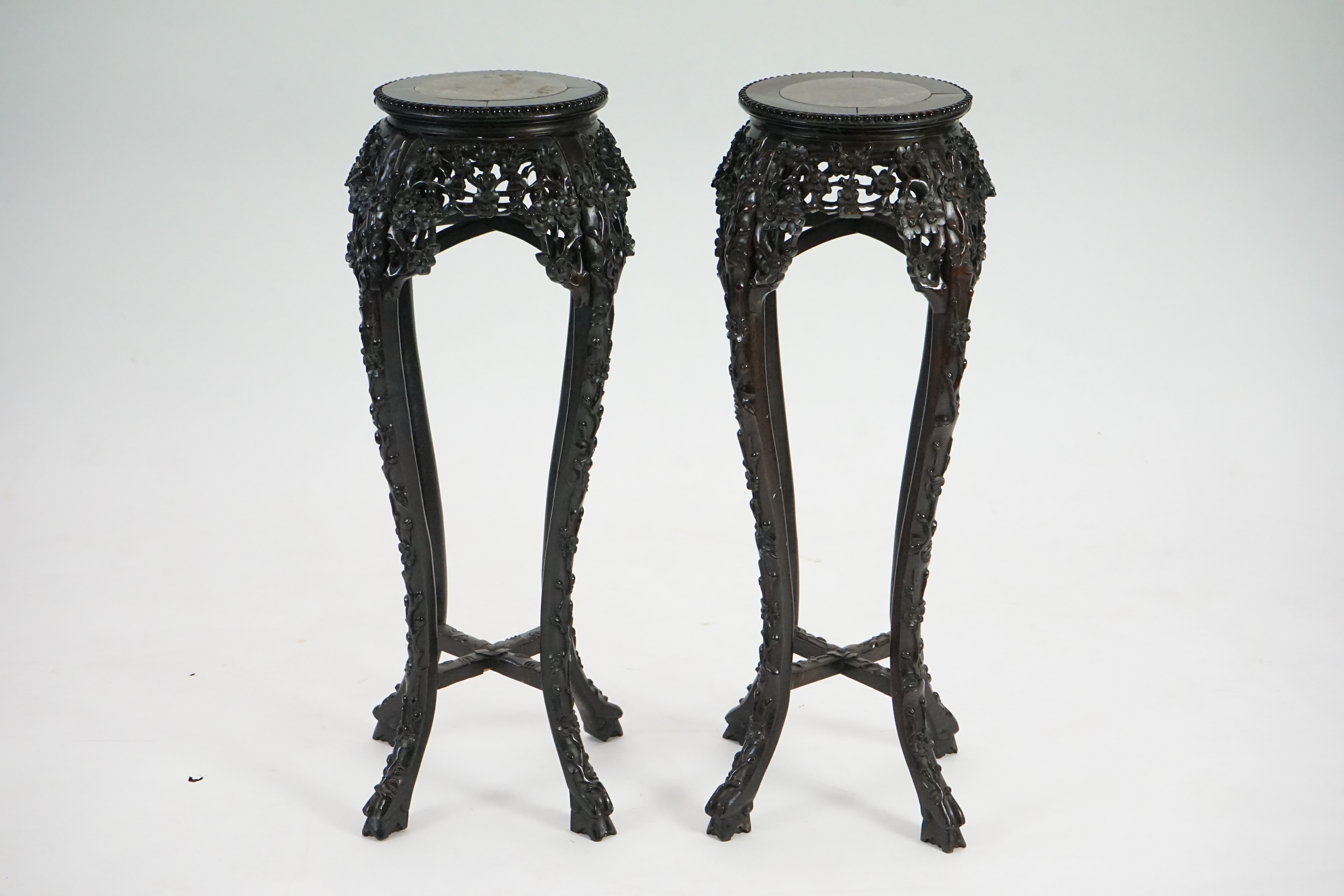 A pair of late 19th century Chinese hongmu and marble inset vase stands, height 91cm. Condition - fair to good